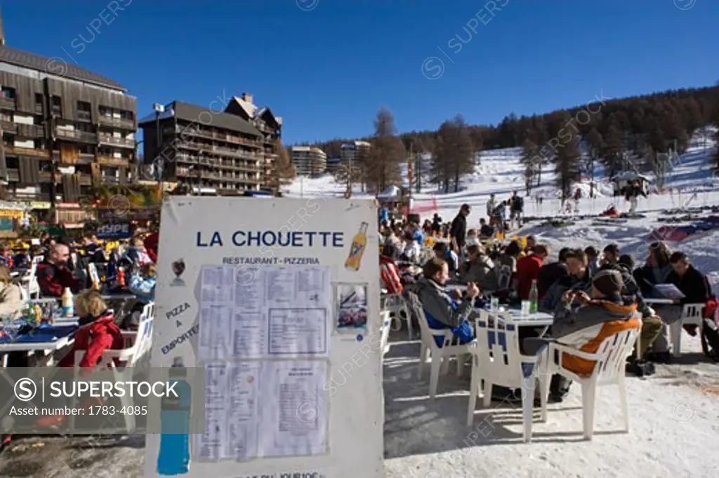 People at the restaurant at the ski resort of Risoul, Situated high in the Alpes Du Sud not far from the town of Briancon The resort shares the Foret Blanche ski area with neighbouring resort of Vars, the largest ski area in the Southern Alps France
