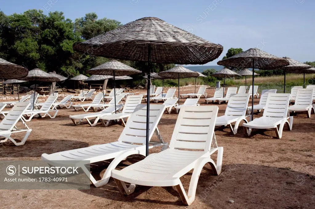 Turkey, Beach chairs and umbrellas at Cleopatra Beach; Gokava Gulf