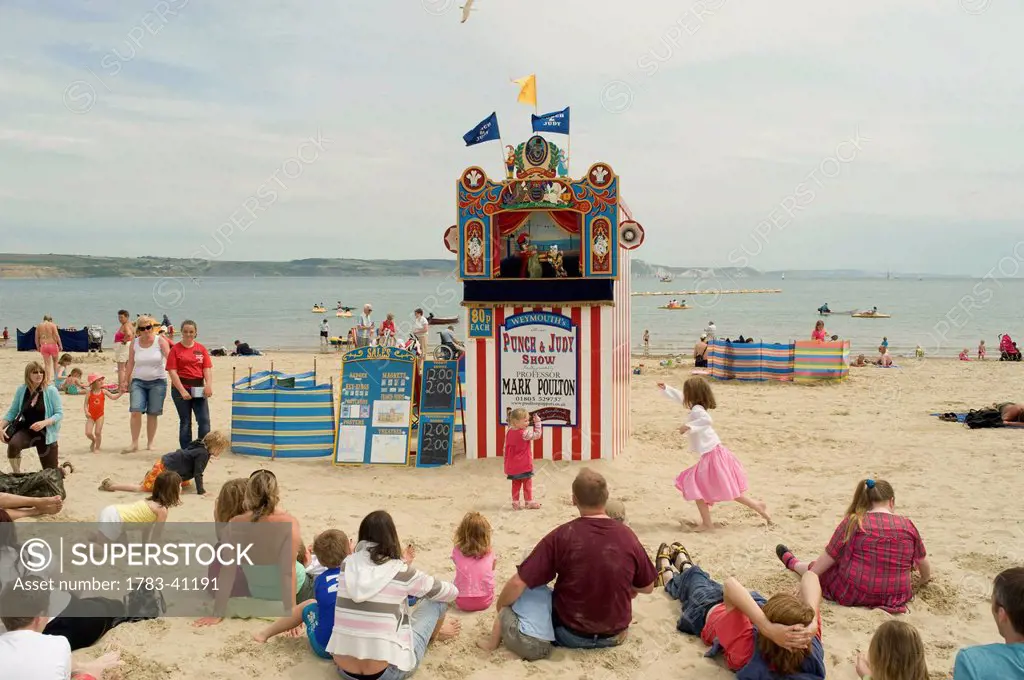 UK, England, Dorset, West Dorset, Punch and Judy on beach; Weymouth