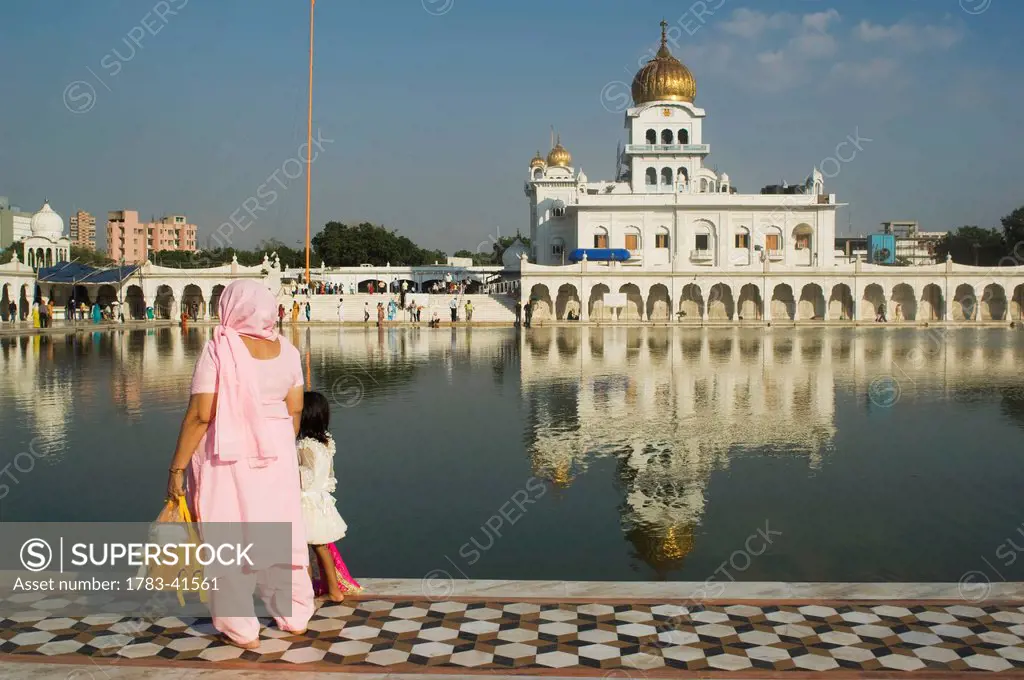 Mother and child at the Gurudwara Bangla Sahib, a Sikh place of worship in Delhi. Gurudwara Bangla Sahib is the most prominent Sikh gurdwara in Delhi....