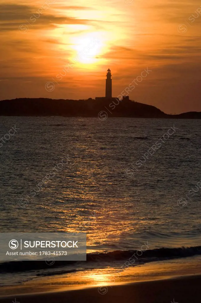 The beaches of the Atlantic Coast of southern Spain - the Costa de La Luz.The lighthouse of Cabo (Cape) Trafalgar at sunset. Andalucia, Spain © James ...