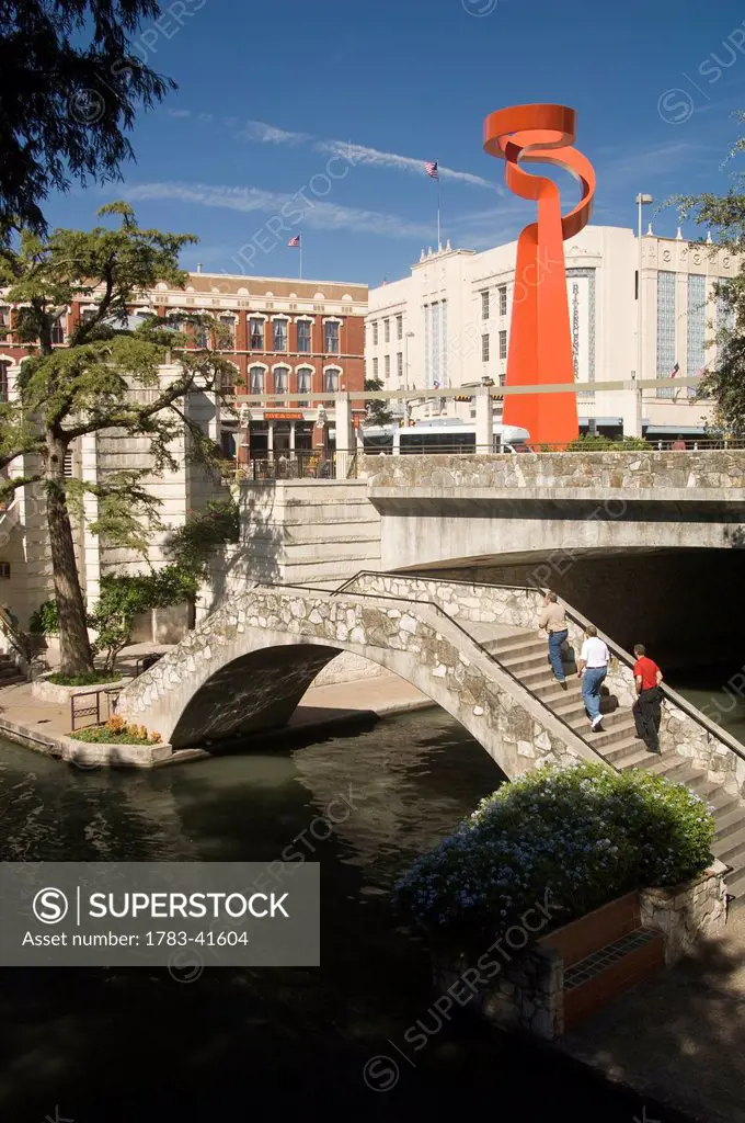 The Scenic River Walk. San Antonio's Number One Attraction - A Below Streetlevel Promenade Of Bars And Restaurants. In The Background Is The Torch Of ...