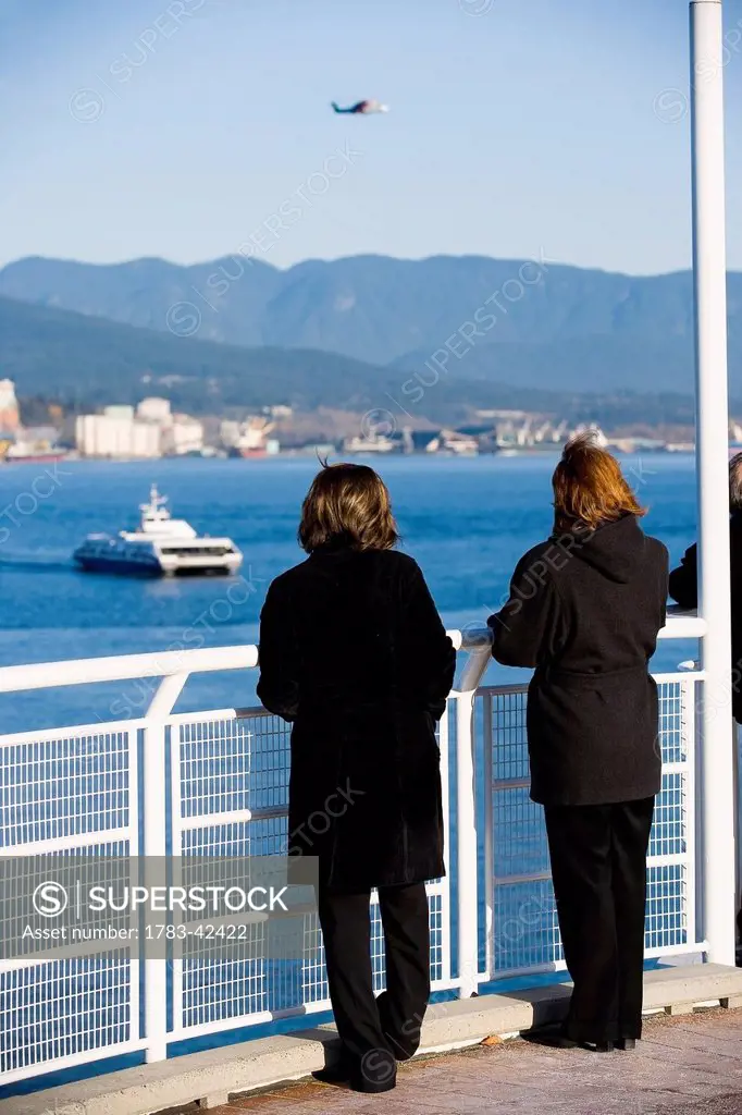 People looking at view, Vancouver Waterfront, Harbor; Vancouver, British Columbia, Canada