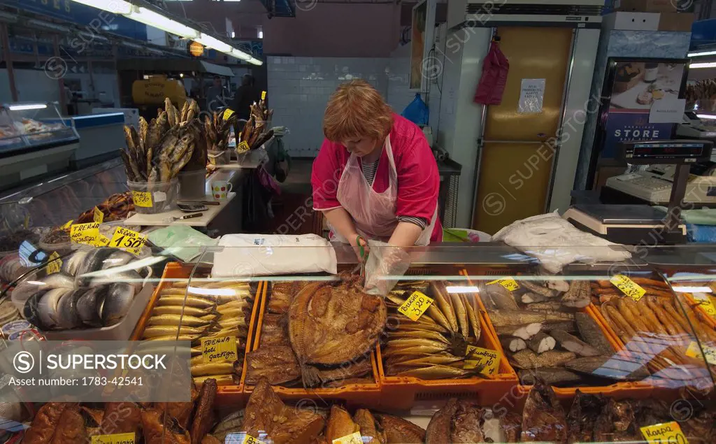 Shop assistant in fish store; Riga, Latvia