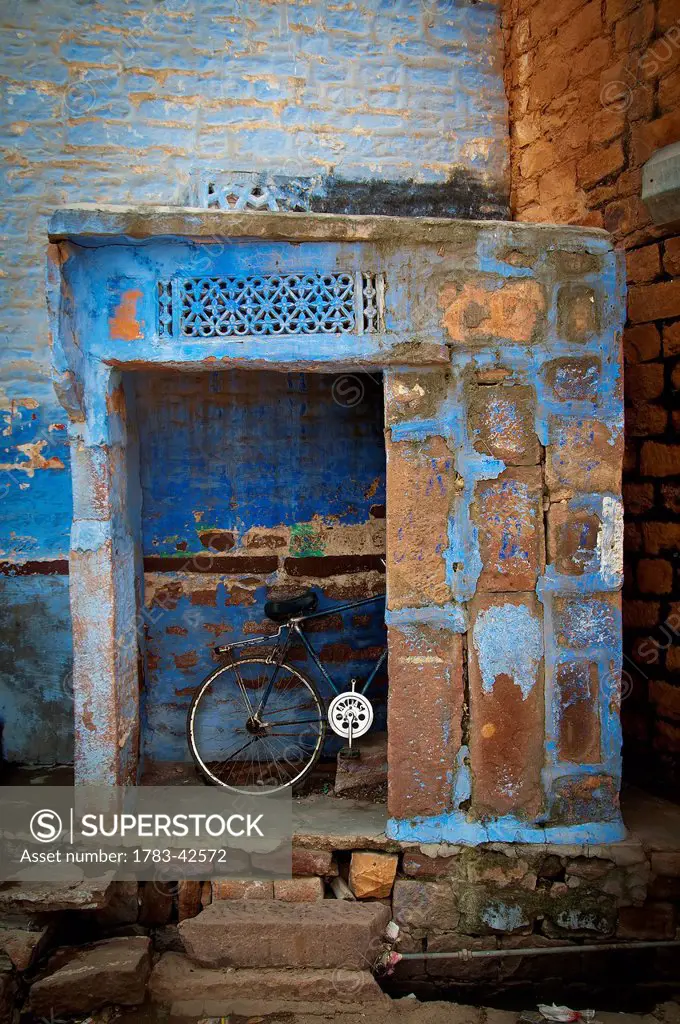 Bike hidden in old annexe; Jodhpur, Rajasthan, India