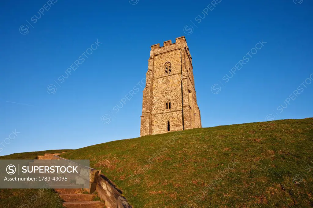 Low angle view of tower; Glastonbury, Somerset, England, UK