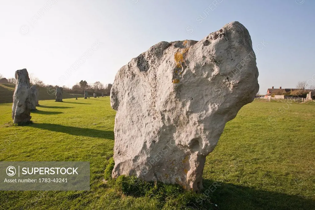 UNESCO World Heritage Site is Neolithic Henge monument containing 3 stone circles around village; Avebury, Wiltshire, England, UK