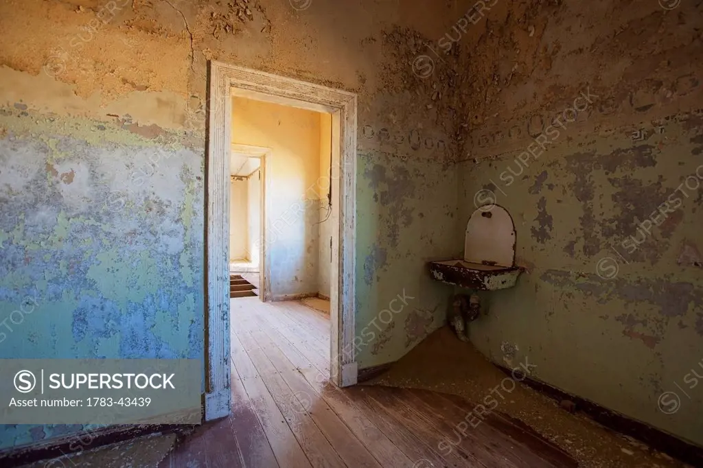 Sink in green and blue room; Kolmanskop Ghost Town; Namibia