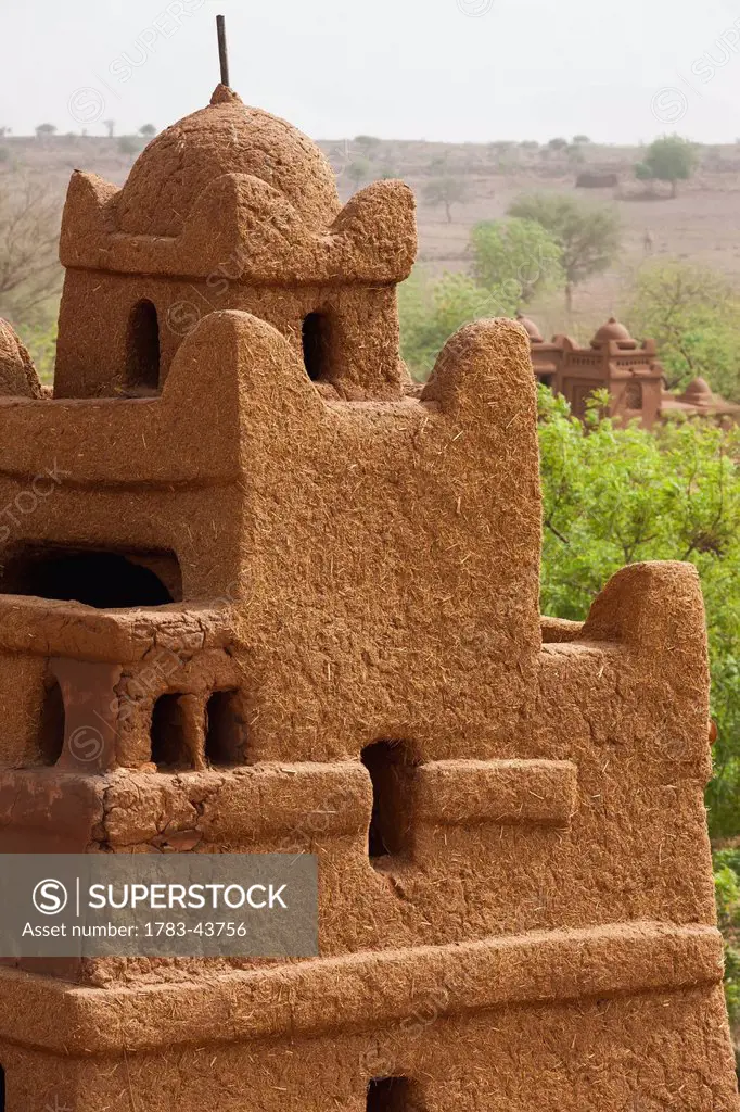 Central Niger, Close up view of one of corner towers of Yaama mud brick mosque. Built 1962-1982 by Master builder El Hadji Falke Barmou using in a cre...