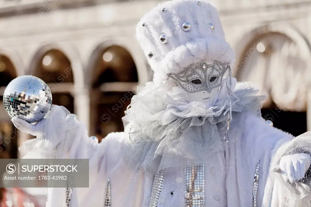 Person in Venetian costume during Venice Carnival; Venice, Italy