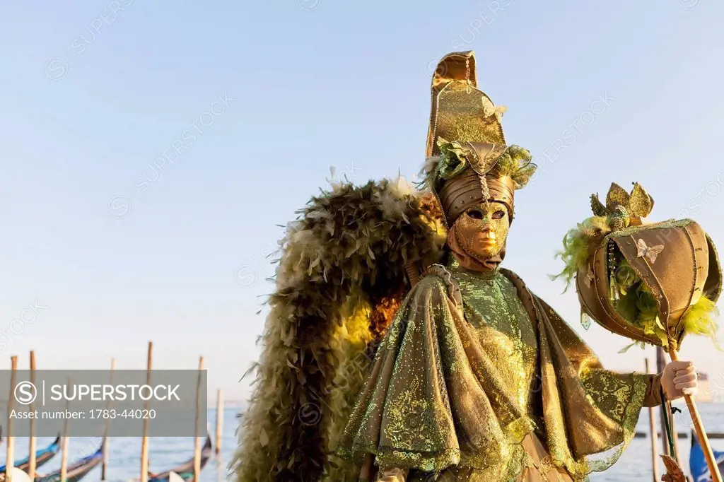 Person in Venetian costume during Venice Carnival; Venice, Italy