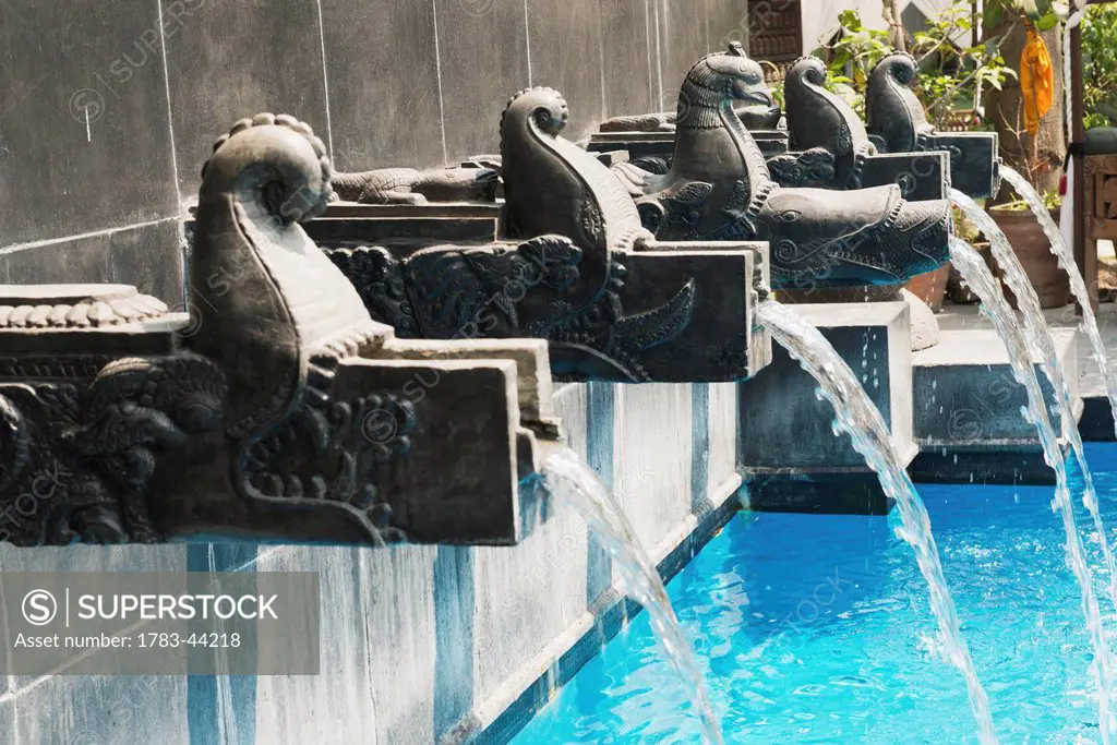 The swimming pool at the Dwarika Hotel in the style of a twelfth century Malla Dynasty bath, the water spouts are from the Lichhavi period; Nepal