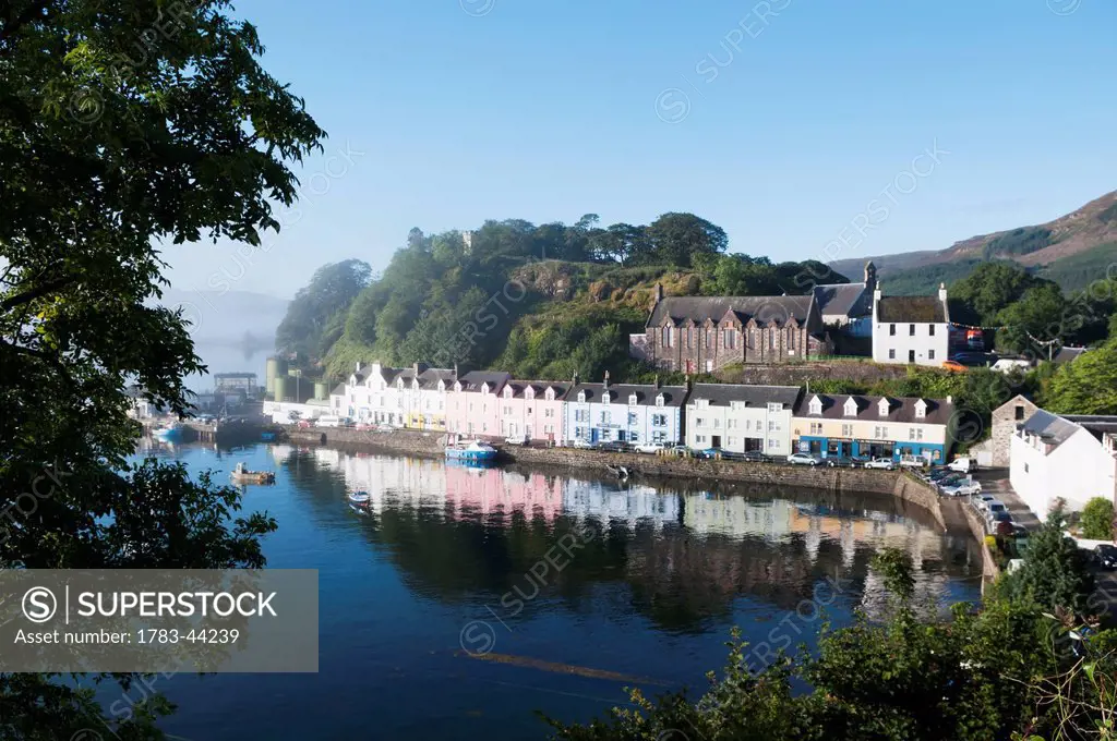 Colourful buildings along the water's edge; Portree, Skye, Scotland