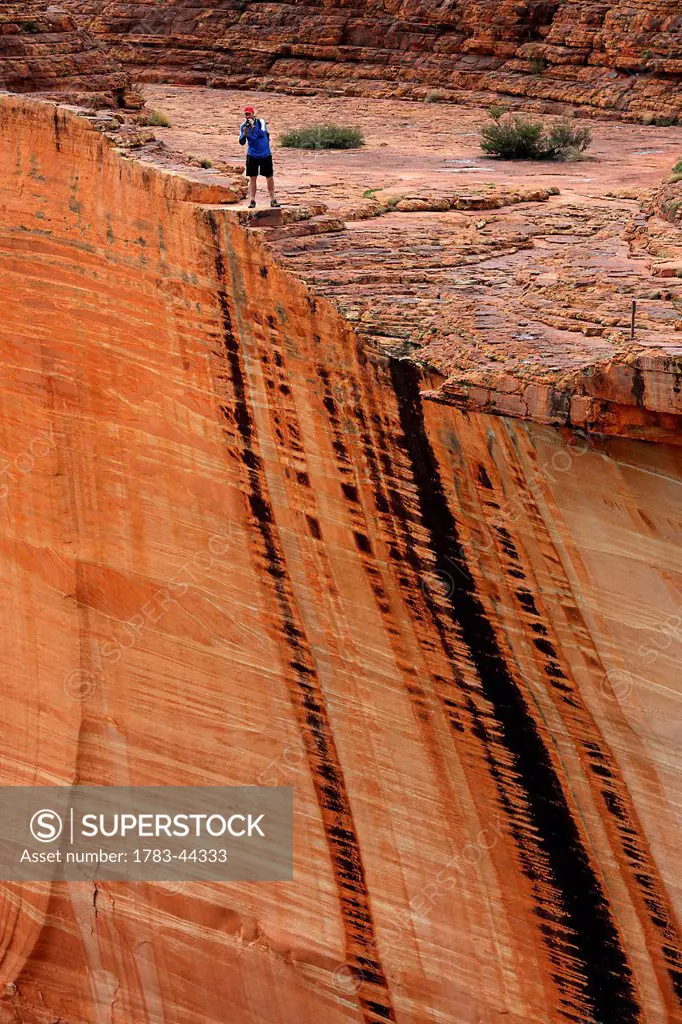 Tourist at Kings Canyon; Northern Territory, Australia