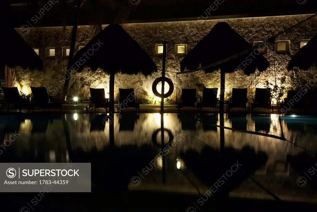 Swimming pool at nighttime; Tulum, Mexico