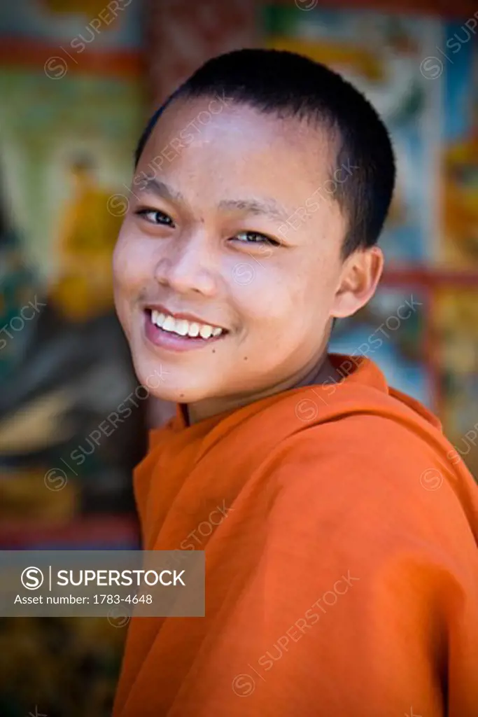 Novice monk at Wat Naluang, Luang Prabang, Northern Laos