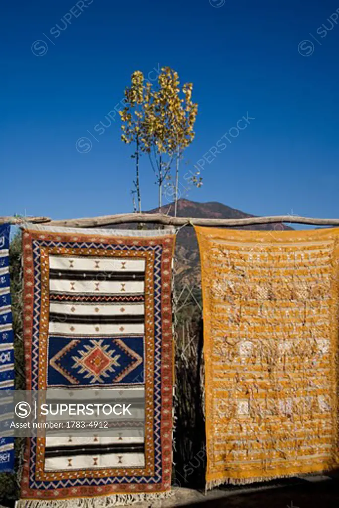 Carpets with mountains in background, Atlas Mountains,Morocco