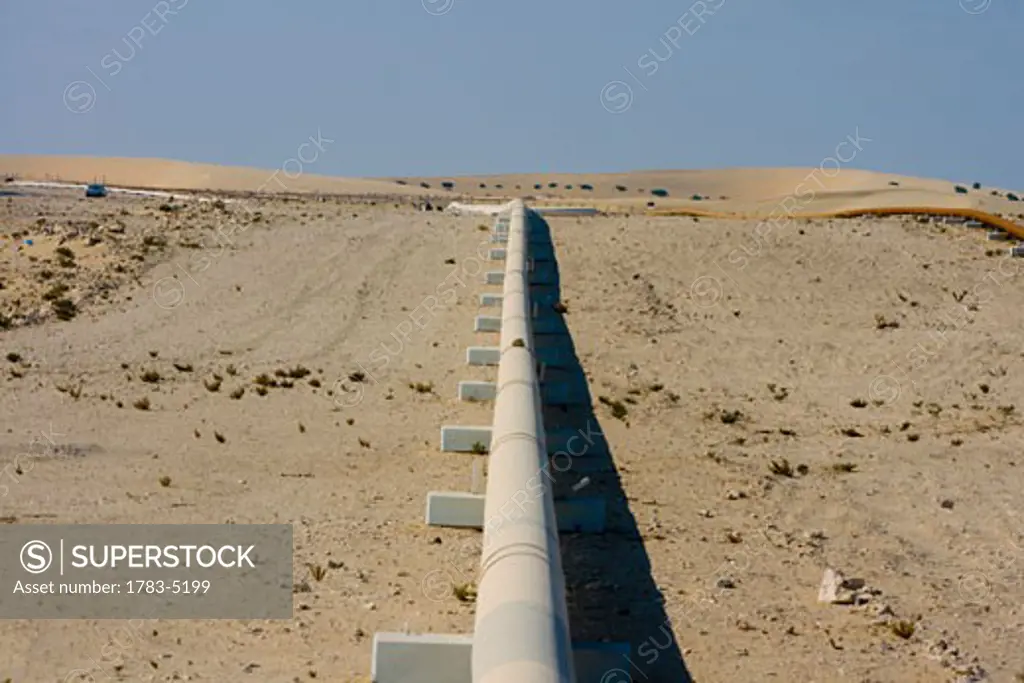 Gas pipeline in desert, Qatar