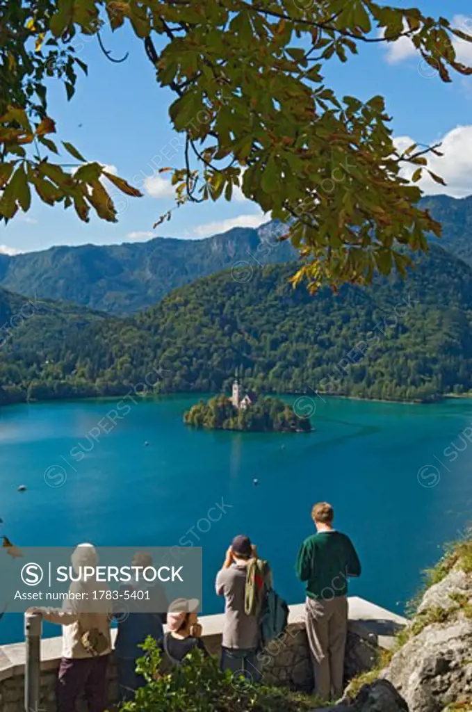 Tourists looking at Lake Bled from castle, Slovenia