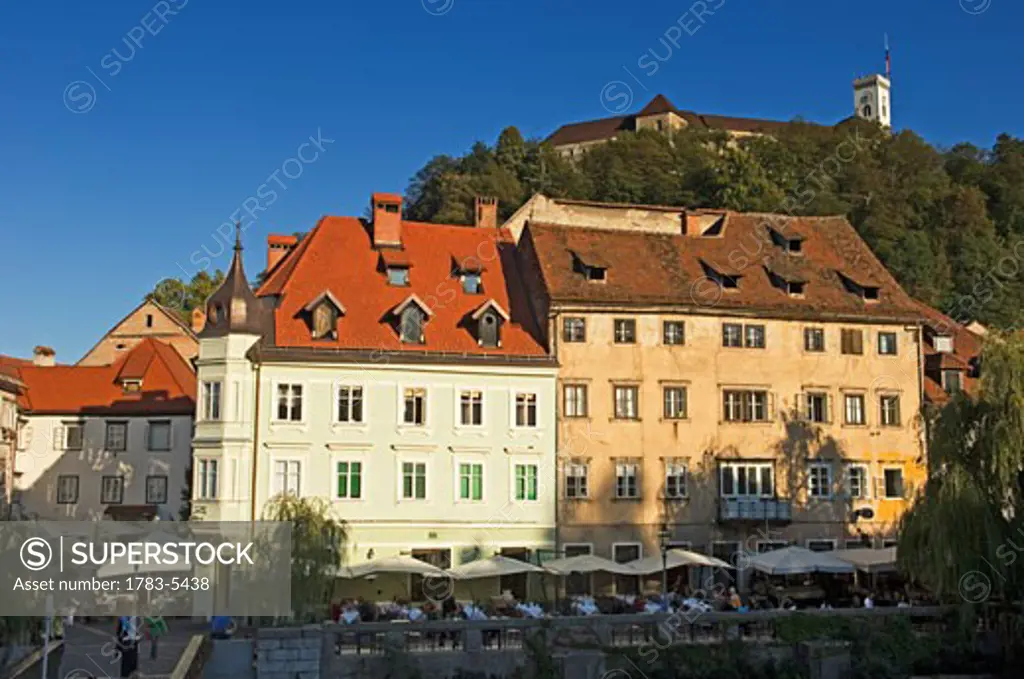 Riverfront Buildings with Castle Hill in background, Ljubljana,Slovenia