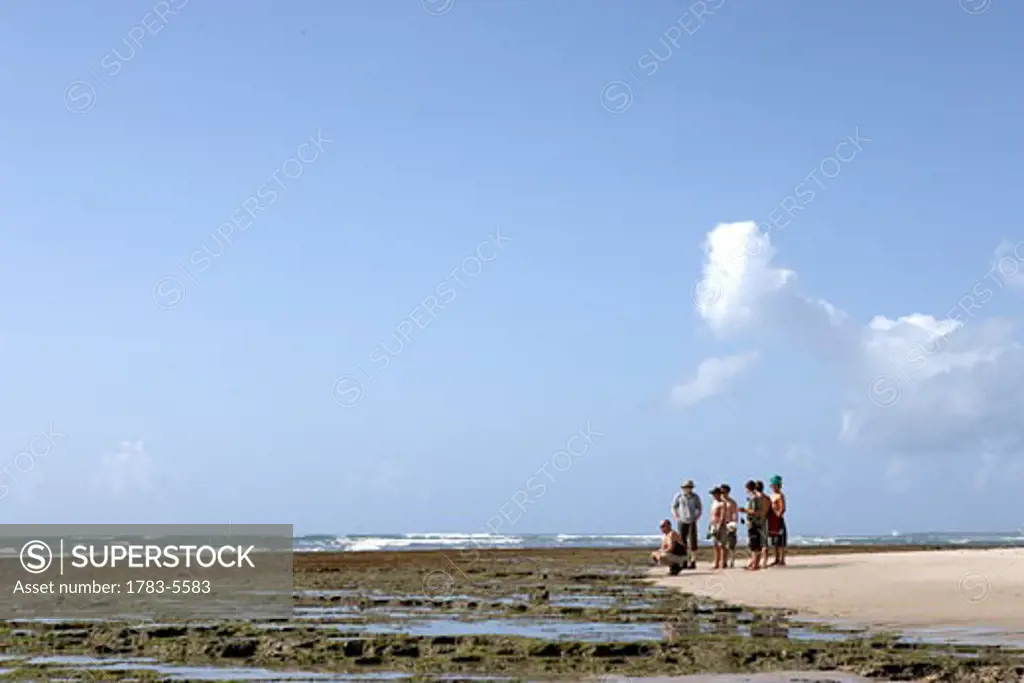 Group of people on beach, south of Dar Es Salaam, Tanzania