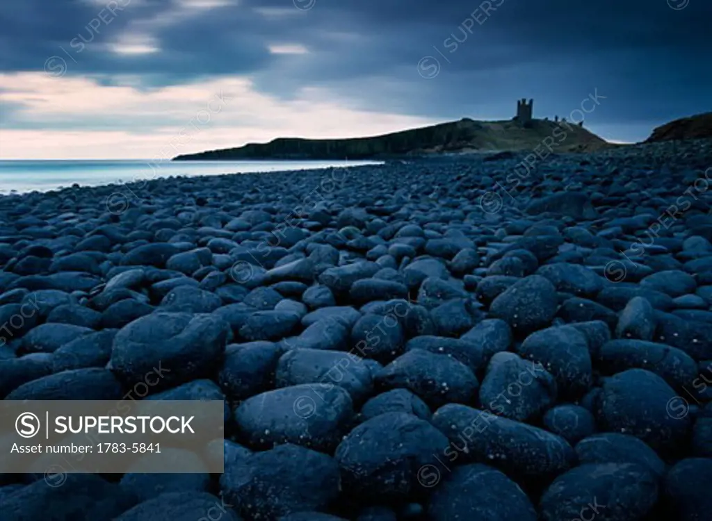 Embleton Bay and Dunstanburgh Castle in distance,night, Northumberland,England,UK