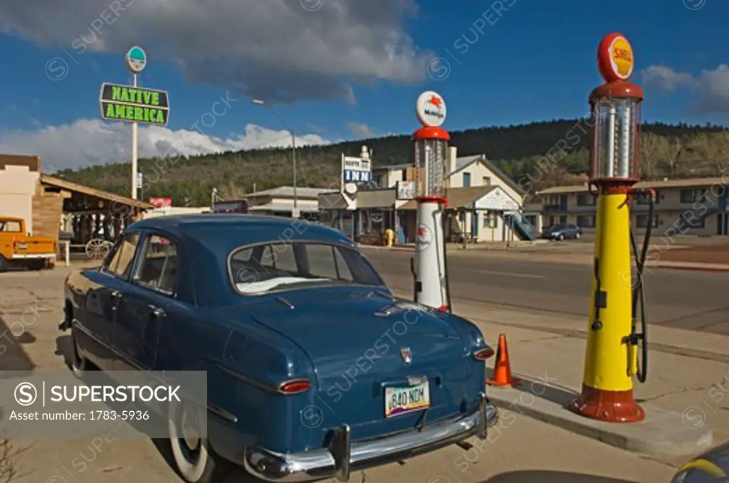 A classic car at a gas station on Main Street in Williams on Route 66, Arizona, USA