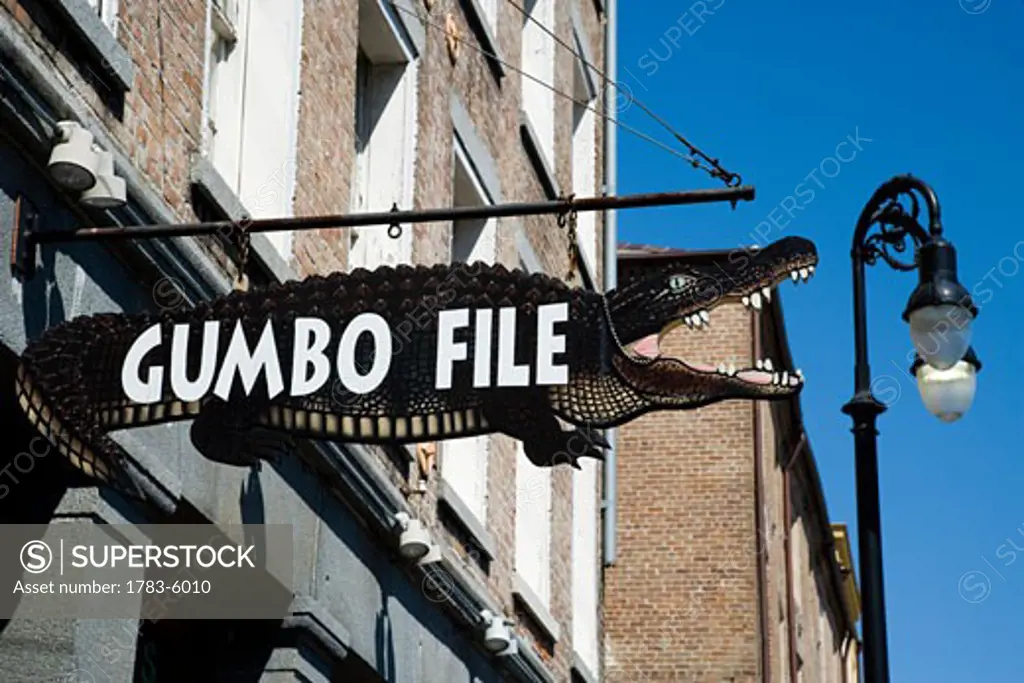 A crocodile shaped sign for Gumbofile, a cafe bar, in the French Quarter, New Orleans , Louisiana, USA