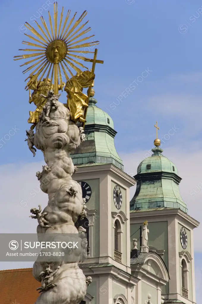 Hauptplatz statue and old cathedral , Linz, Austria