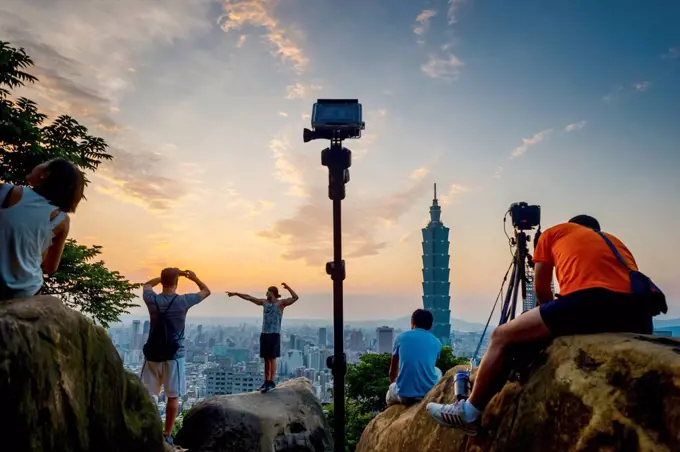 Some tourist taking pictures of Taipei from Elephant mountain; Taipei, Taiwan, China