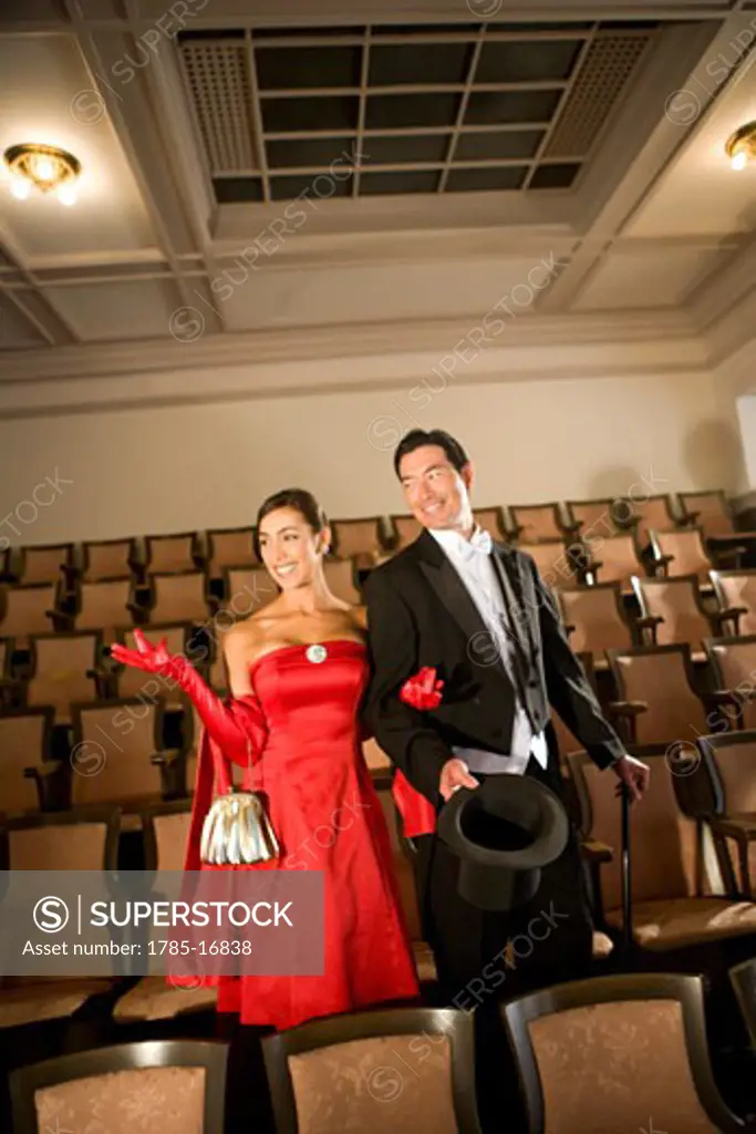 Elegant multi-racial couple on a date at the opera