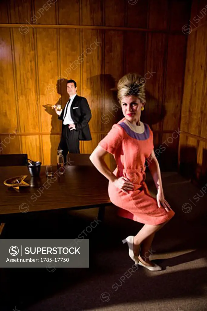 Vintage portrait of businessman and business woman in boardroom