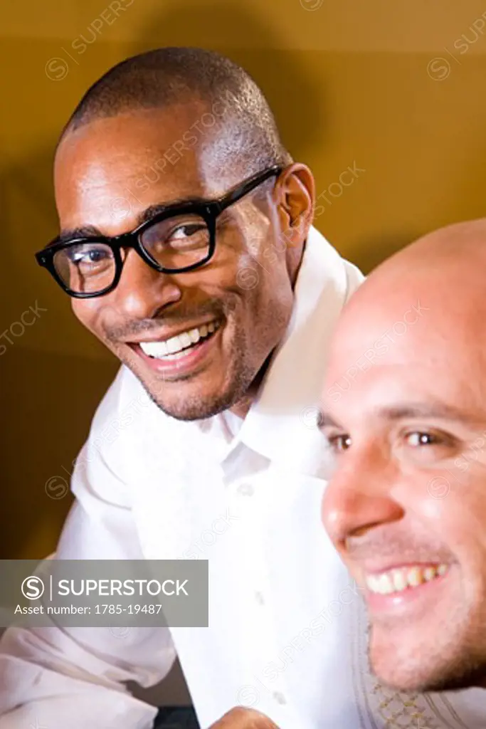 Close-up of African American and Hispanic men