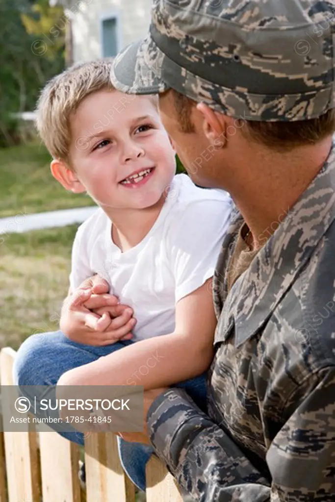 Close up of boy with military dad