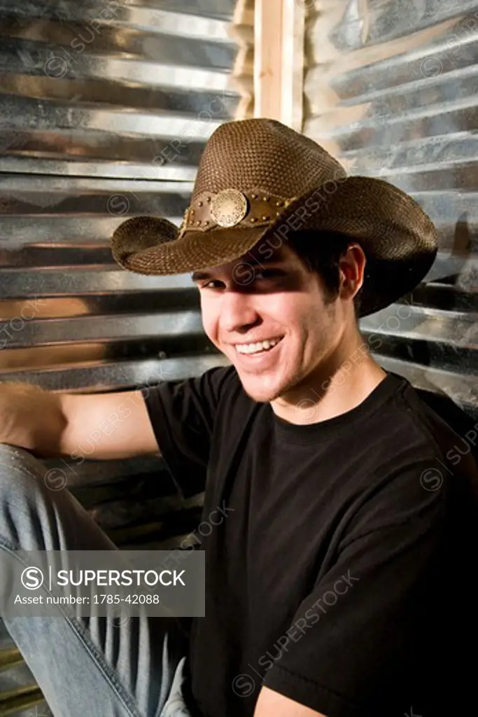 Portrait of young cowboy