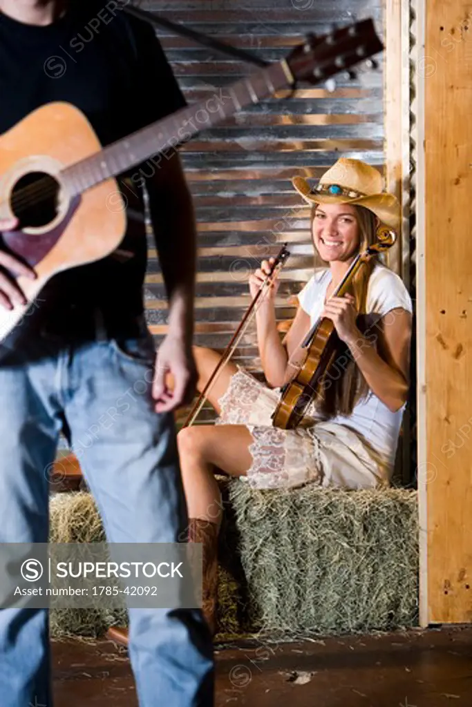Country music, young woman with fiddle