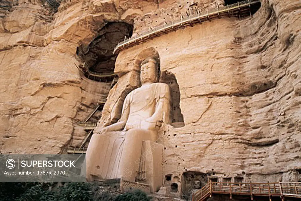 Ancient carved Buddha of Tang and Song dynasty in Bingling Temple Rock Cave, Liujia Gorge, Yongjin County, Gansu Province of People's Republic of China