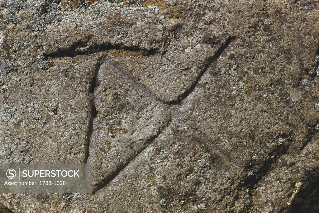 Close-up of the symbol of goddess Tanit on a rock, Sant'Antioco, Sardinia Region, Italy