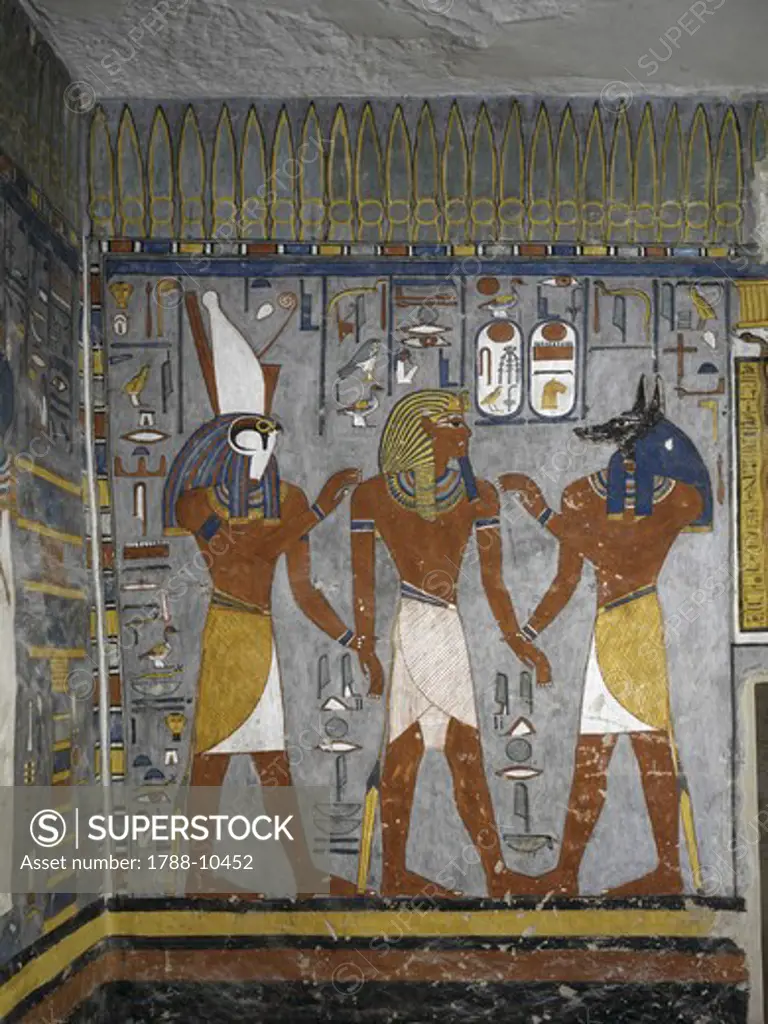 Egypt, Thebes, Luxor, Valley of the Kings, Tomb of Ramses I, mural painting of Pharaoh between Harsiesis and Anubis in Burial chamber from 19th dynasty