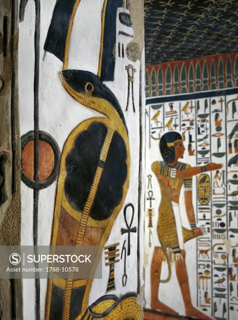 Egypt, Thebes, Luxor, Valley of the Queens, Tomb of Nefertari, Burial chamber, Mural paintings, Uraeus serpent and 'iun-mutef' Horus in the background