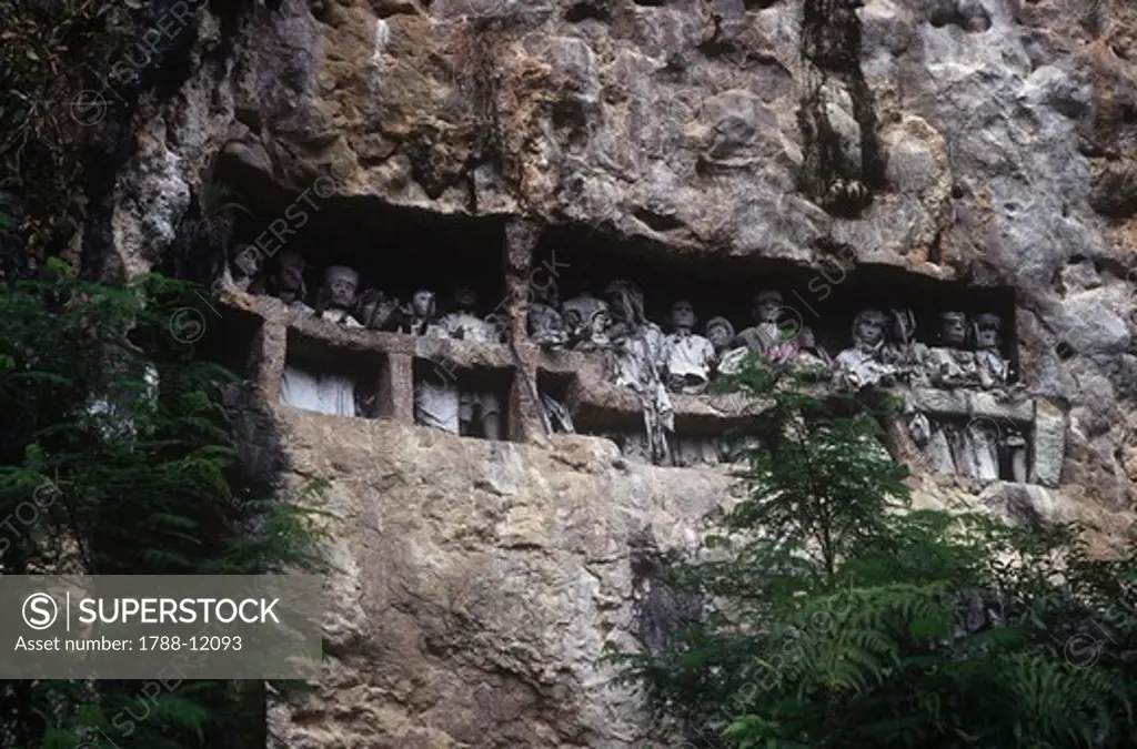 Indonesia, Island of Sulawesi (Celebes), village of Suaya, burial niches with effigies of dead (Tau Tau)