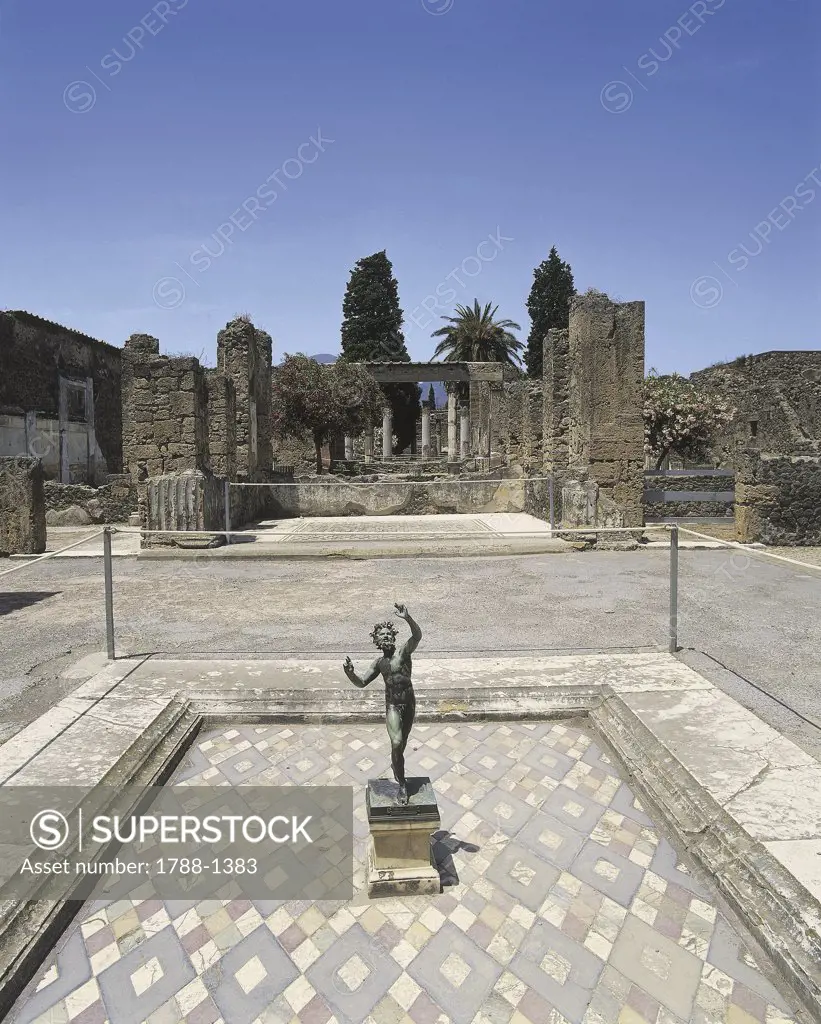 Statue in an atrium, House of the Faun, Pompeii, Campania Region, Italy