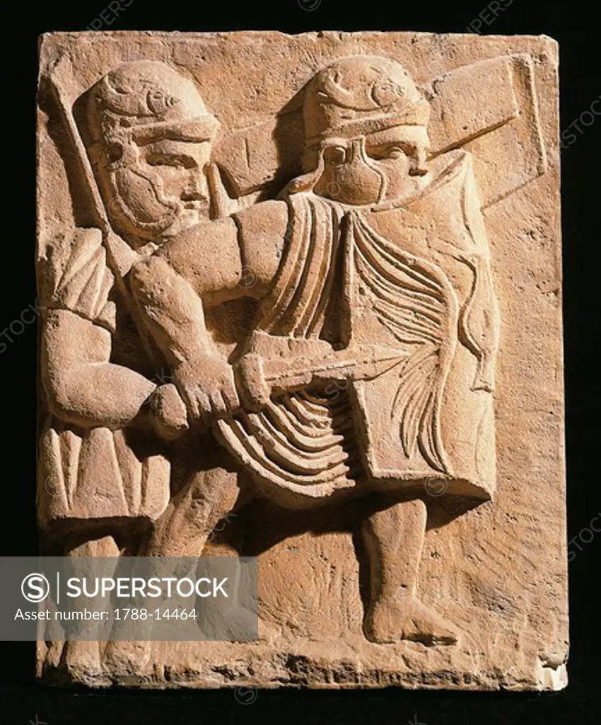 Relief portraying legionnaires mounting assault