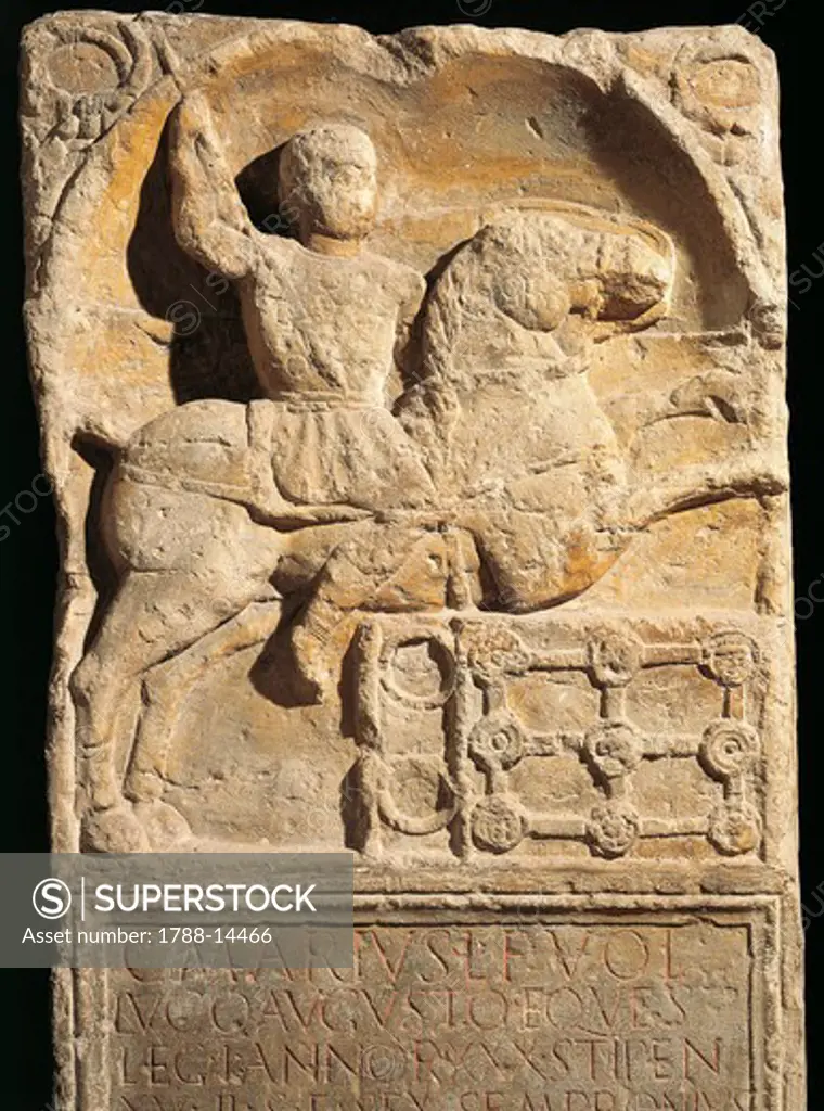 Knight from Caio Mario First Legion's stele, with shield, lance and ornamentation, nine phalera and two armilla, relief in bottom right