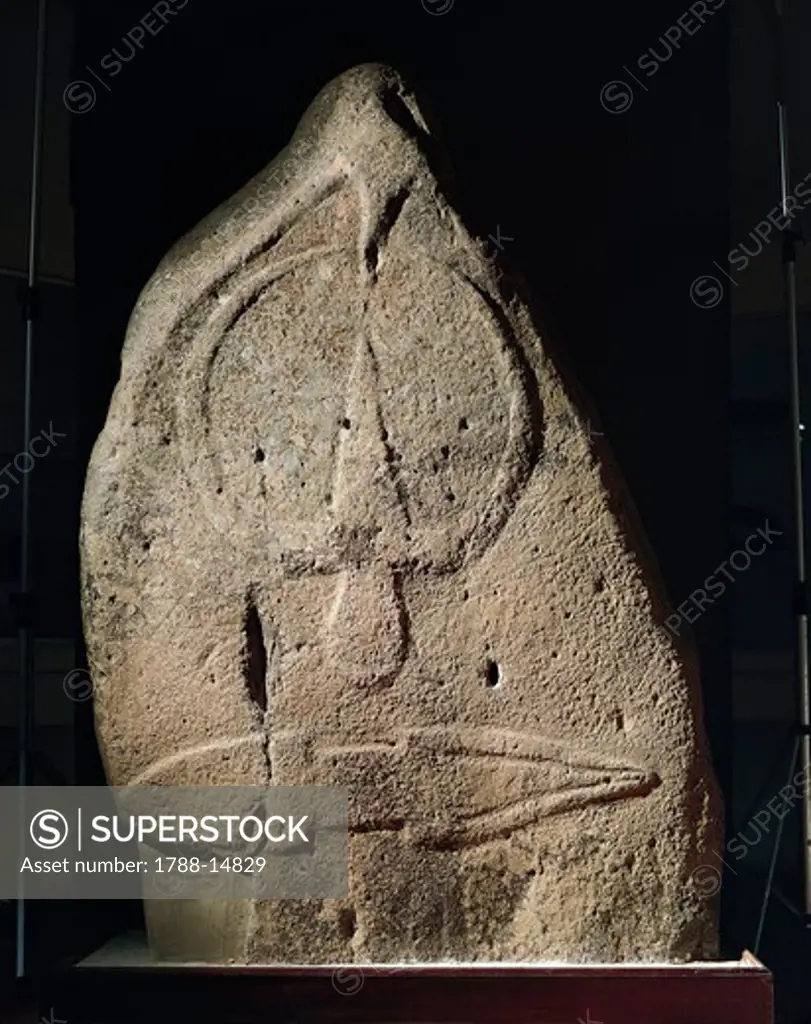 Nuragic civilization. Menhir-statue of male figure, from Laconi, Sardinia Region, Italy