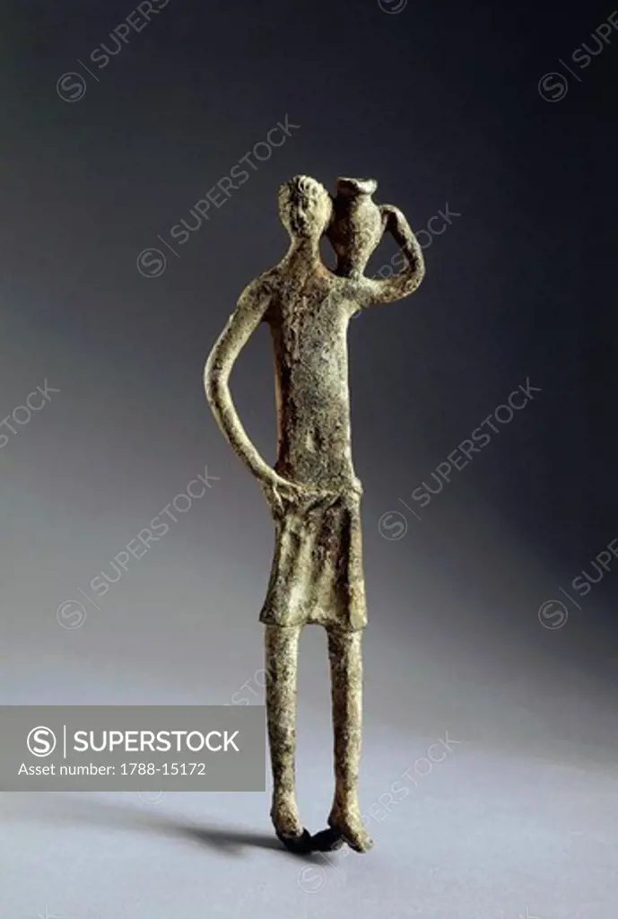 Italy, Pisa Province, Volterra, Bronze statue depicting male figure making offering