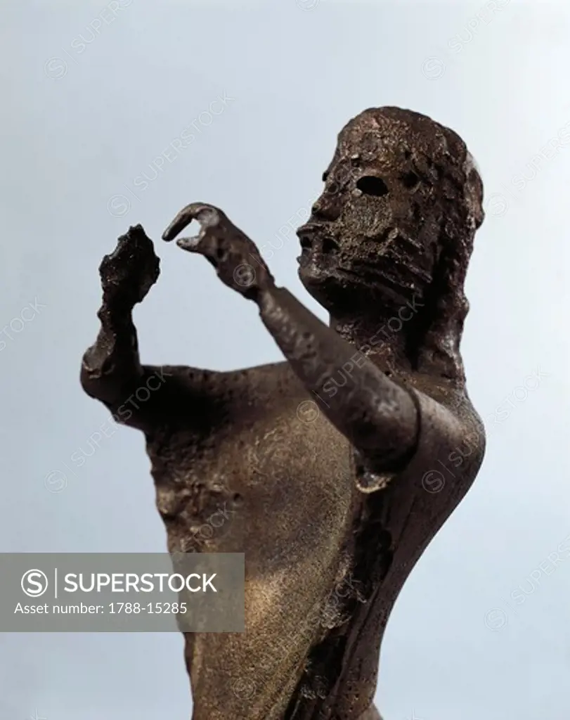 Bronze statue depicting flute player from Samo
