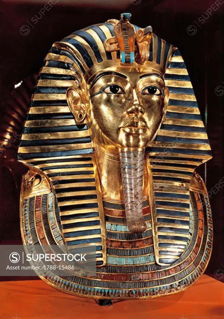 Egyptian civilization. Gold funerary mask with lapis lazuli and turquoise from Pharaoh Tutankhamen