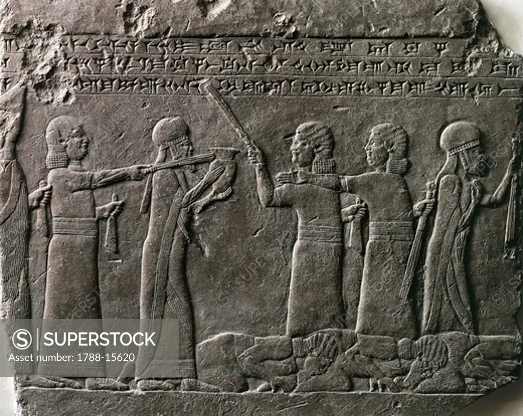 Detail of relief depicting Babylonian prisoners paying homage to king Ashurbanipal and queen, from Palace of Ashurbanipal, ancient Nineveh, Iraq