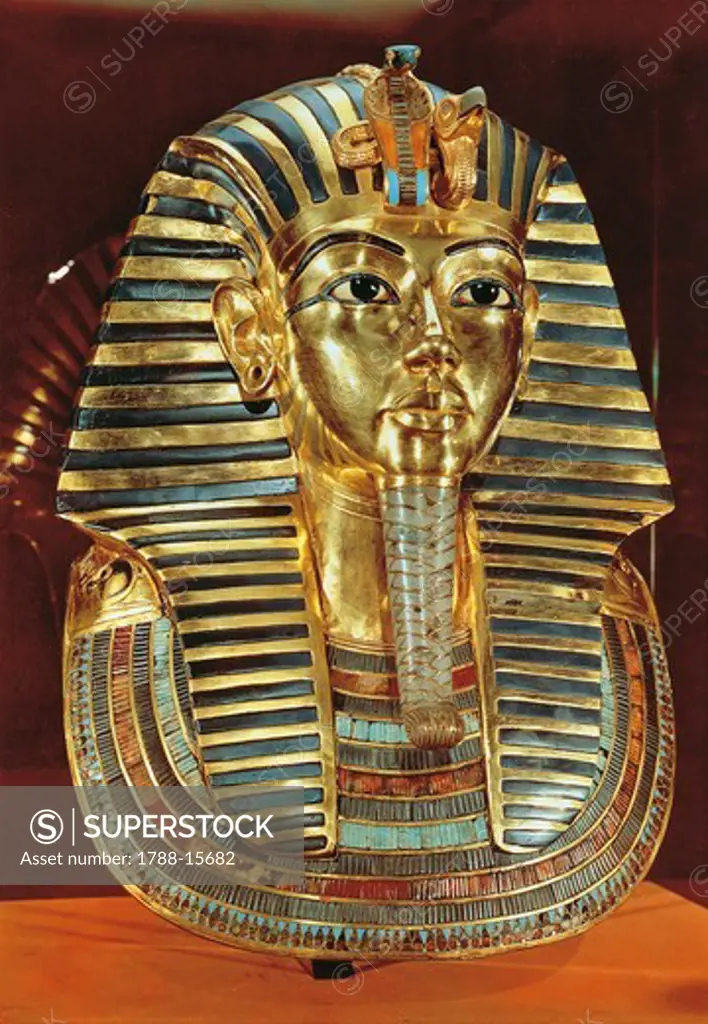Burial mask of gold, lapislazuli, obsidian and turquoises of pharaoh Nebkheperura Tutankhamen (1341-1323 B.C.), 18th dynasty, New Kingdom